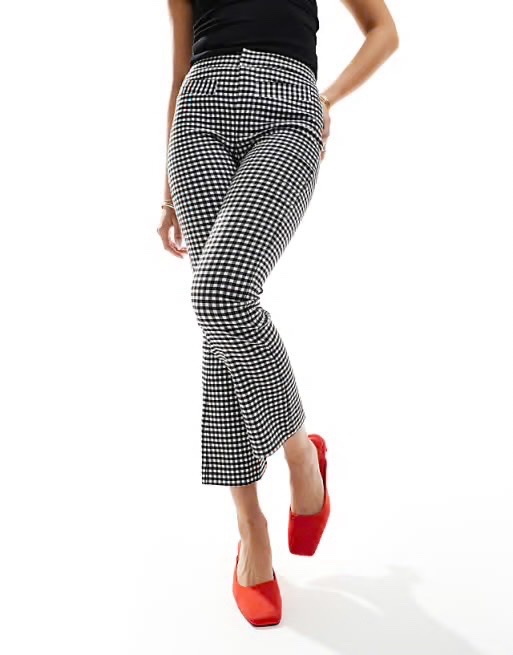 Pantalon à carreaux noir et blanc