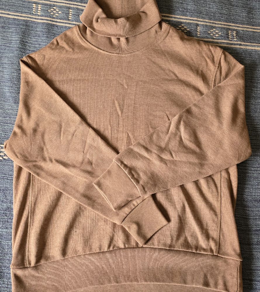 Pull col montant
