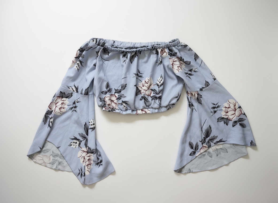 Crop top bardot fleuri à manches évasées