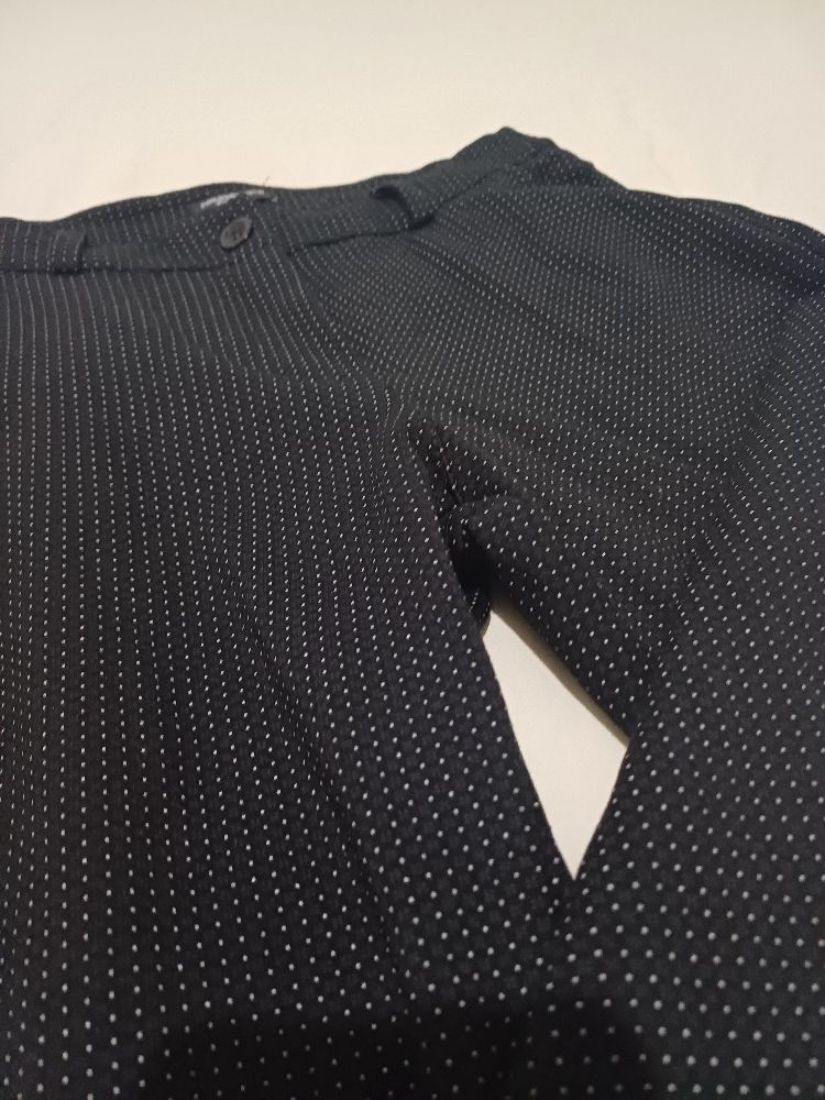 Pantalon noir à poid blanc