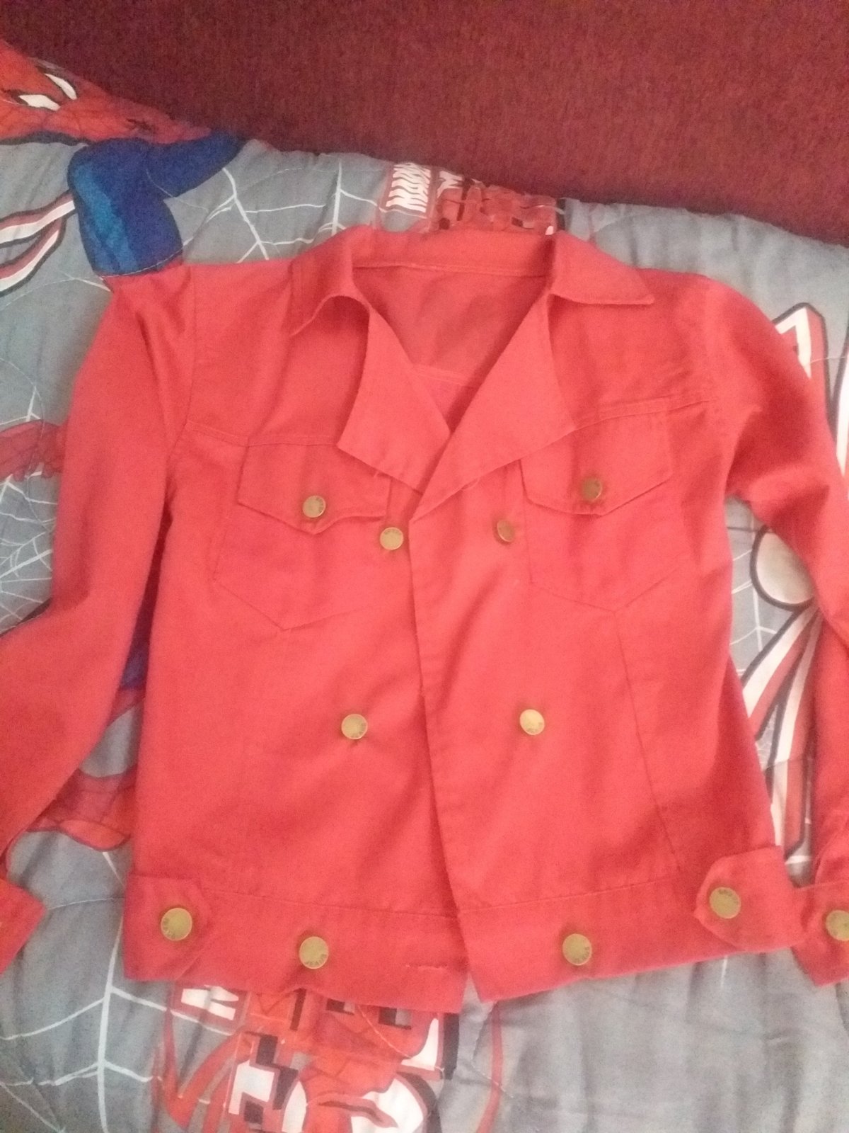 Veste rouge imprimé garcons 10 ans 