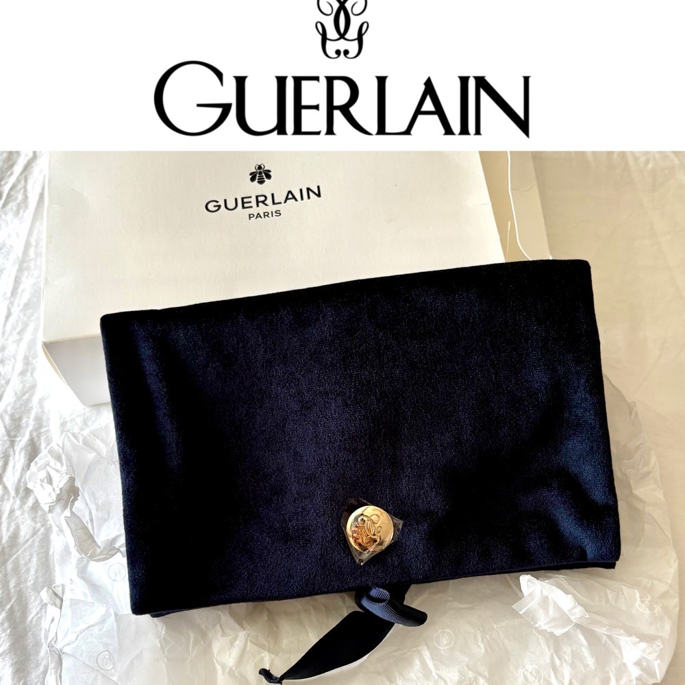 Pochette à cosmétiques Guerlain en velours bleu marine