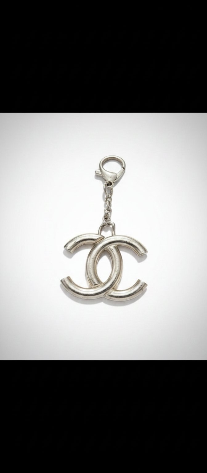 Joli porte clès doré chanel original et raare