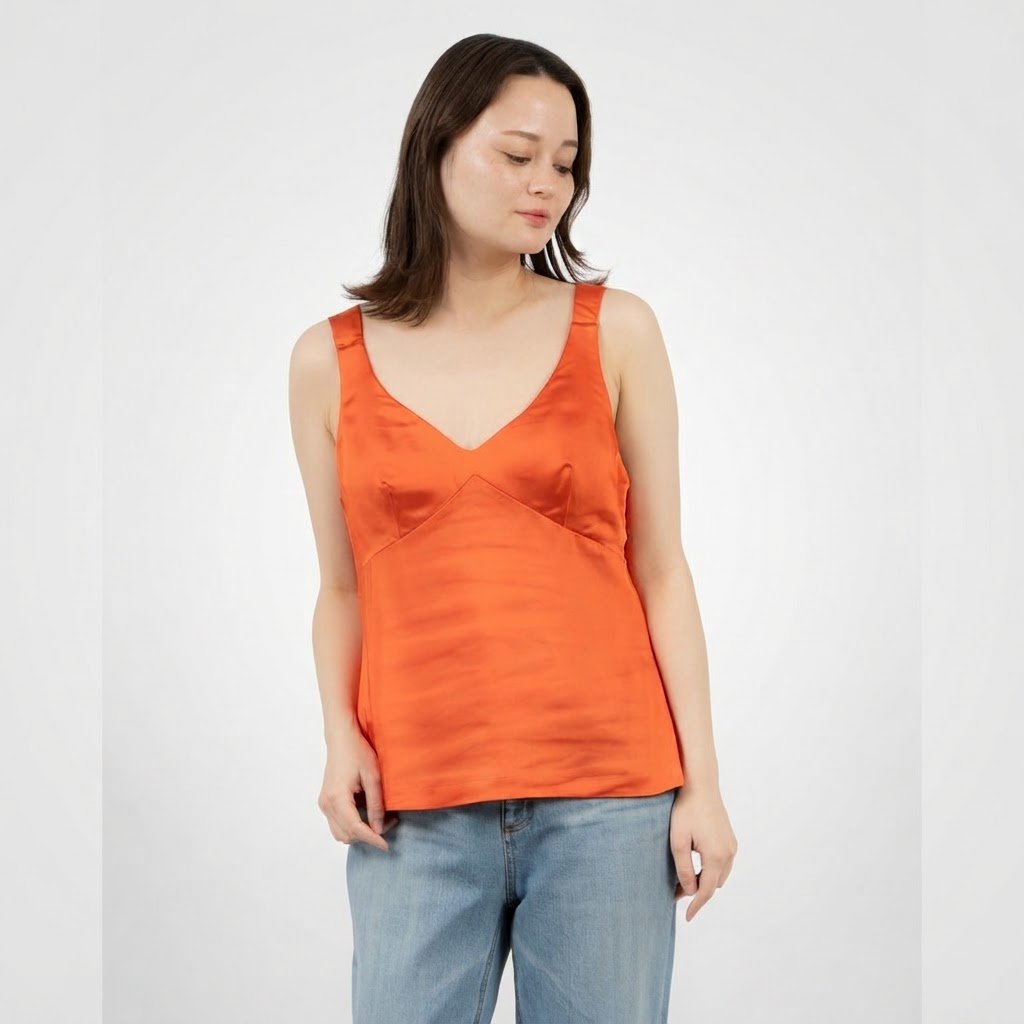 Joli Haut Benetton orange effet satin magnifique 
