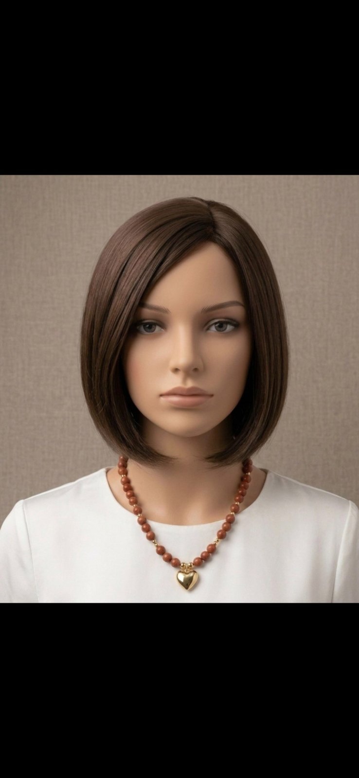 Collier marron avec motif coeur 25dt