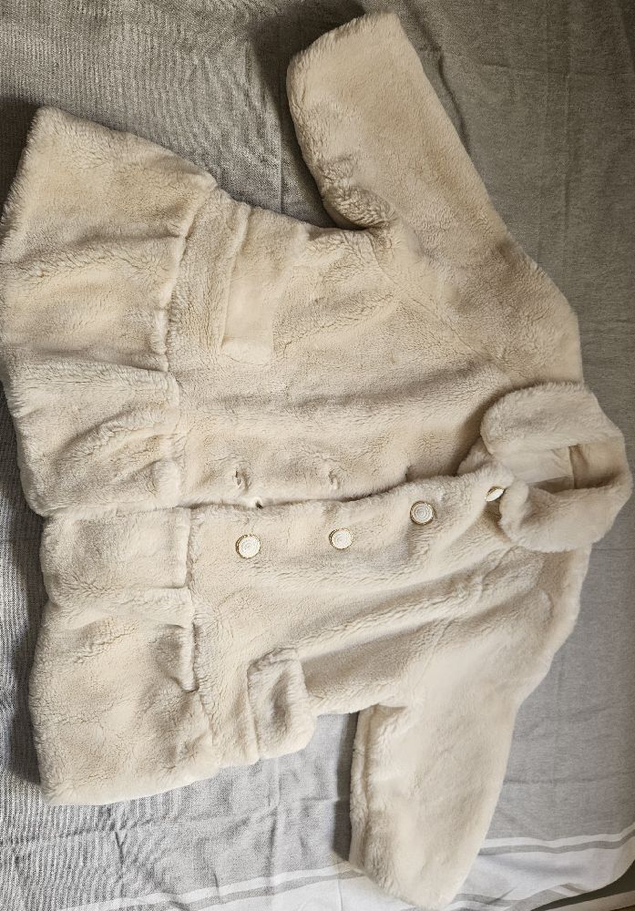 Manteau fourrure crème