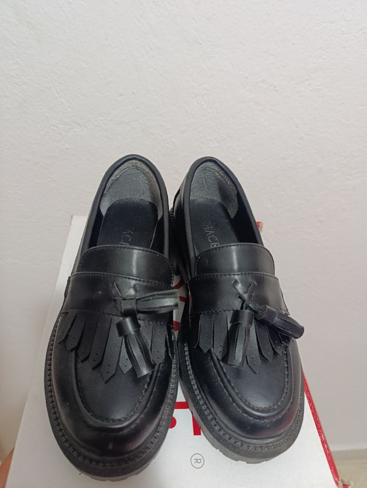 Derbies rosace en noir 