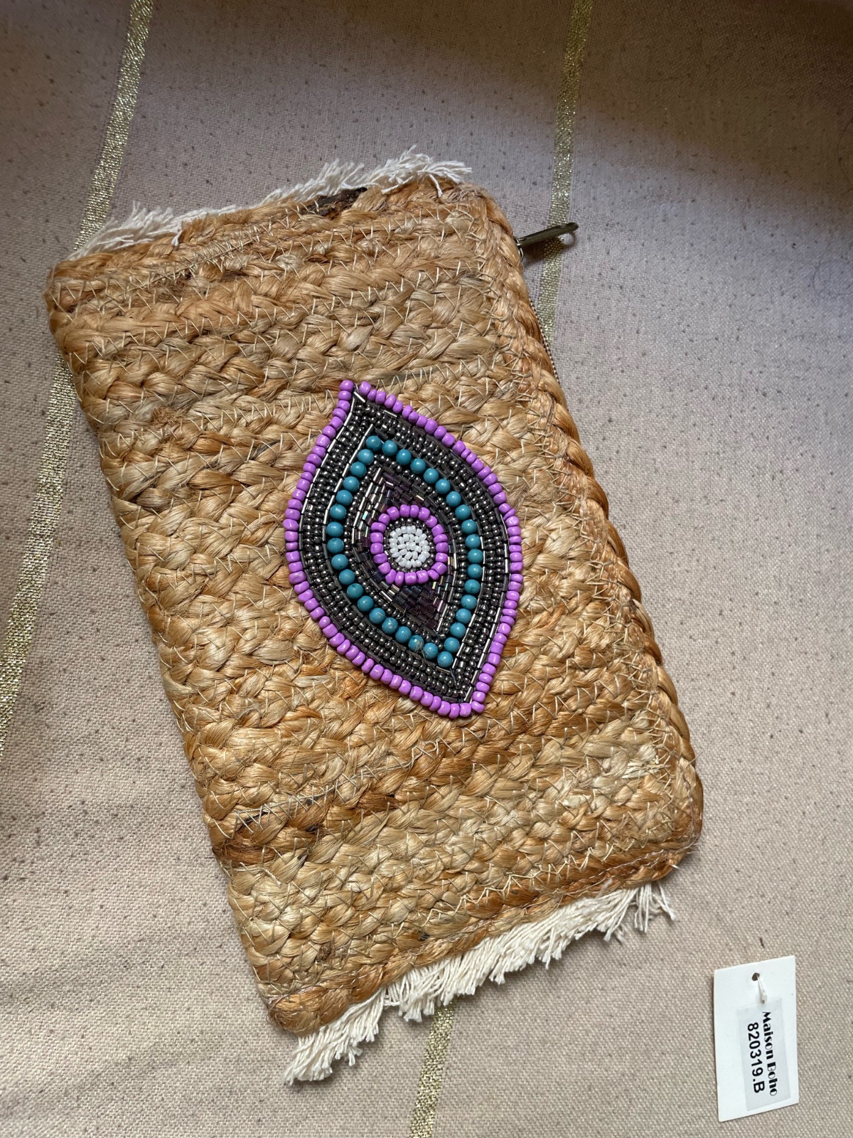 Petite pochette a oeil brodé