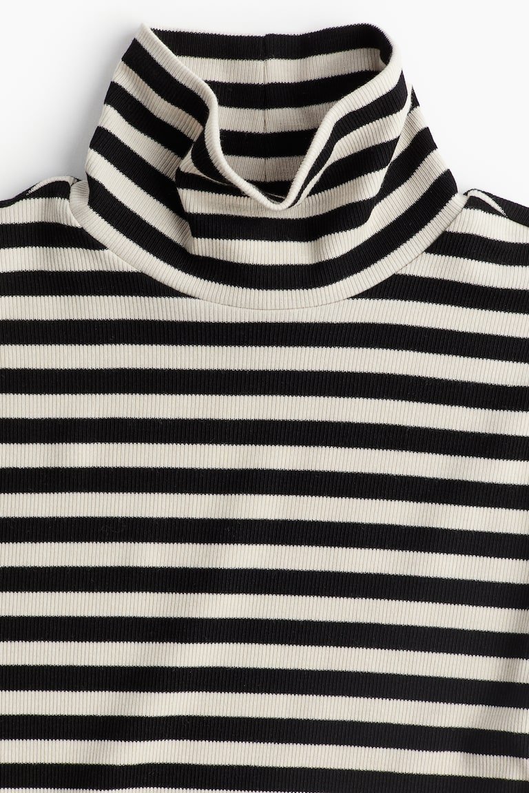 Pull col montant H&M couleur écru et noir