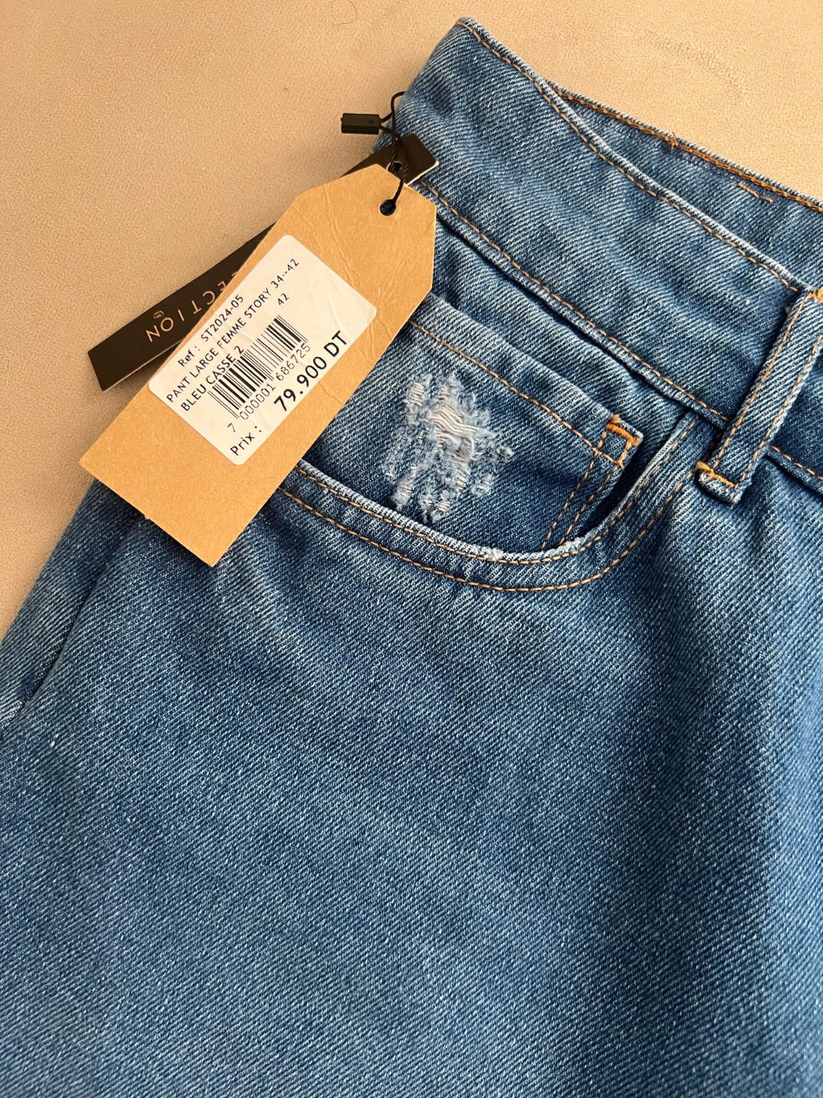 Jean neuf avec etiquette large taille haute