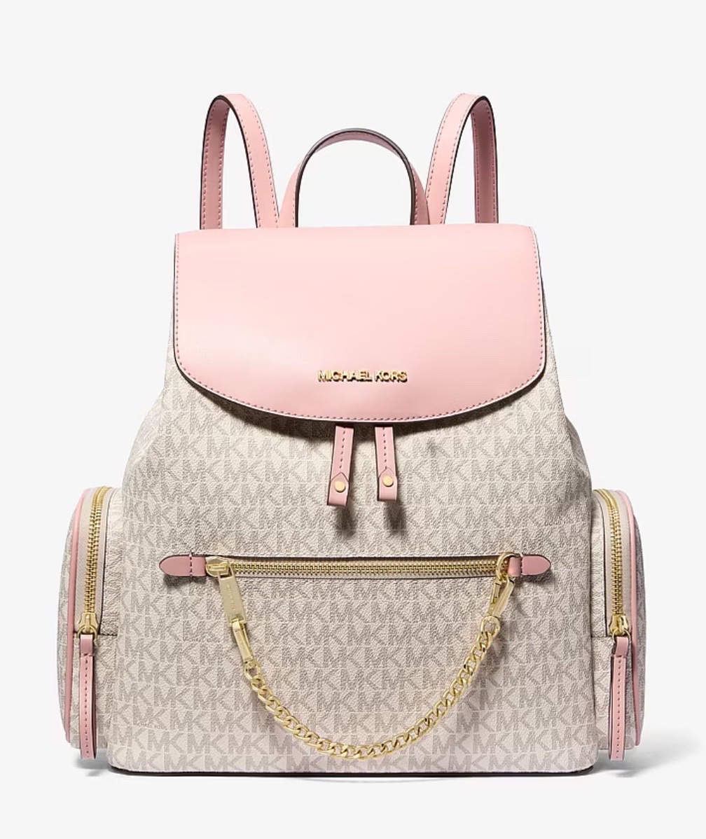 Michael Kors Jet Set Large Logo Backpack in the "Powder Blush Multi" color scheme.