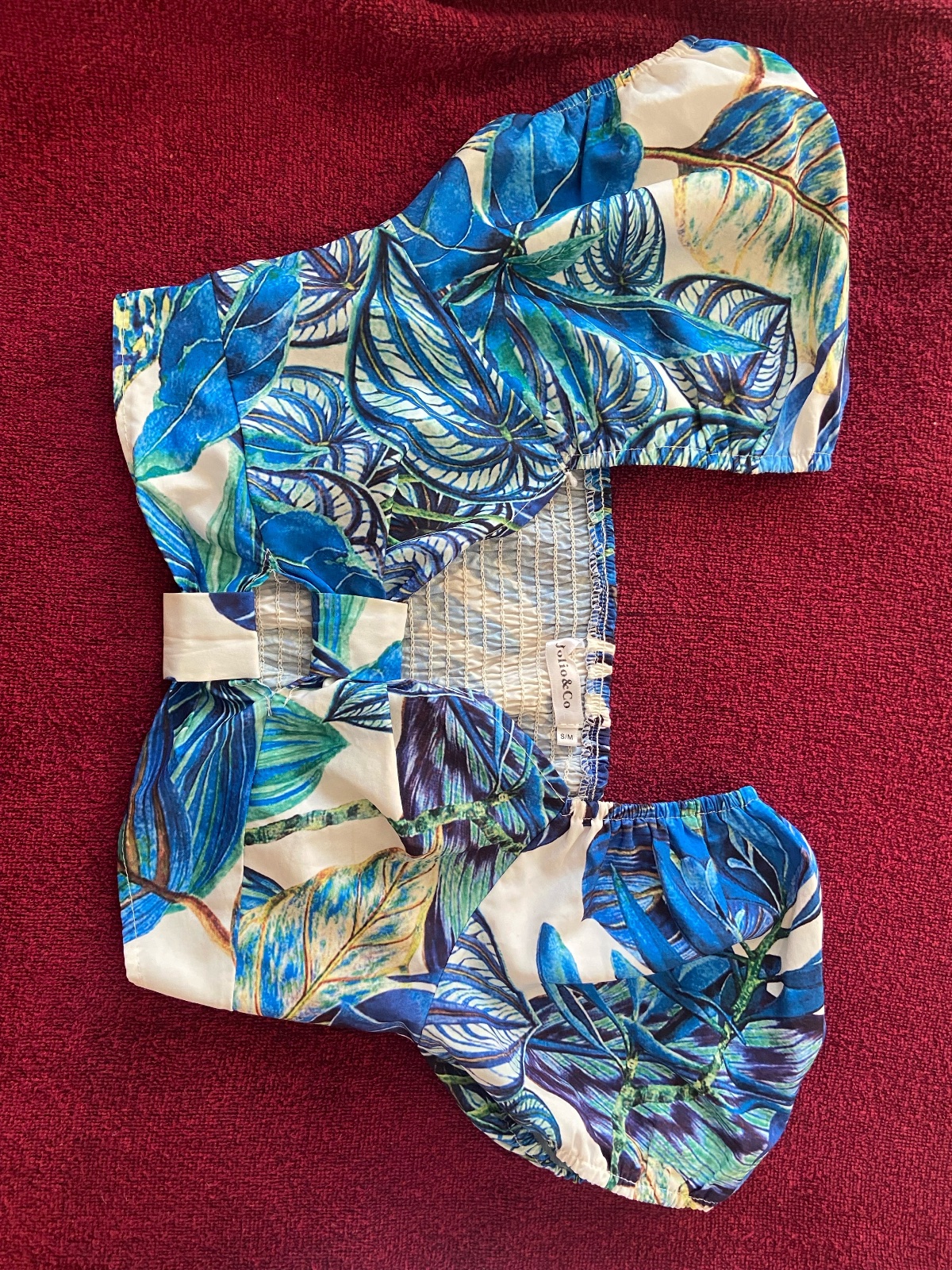 Crop top bleu motifs tropicaux / feuilles (Marque : Jolio & Co, Taille : S/M)