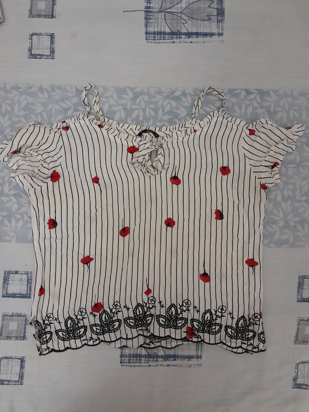White with flowers shirt