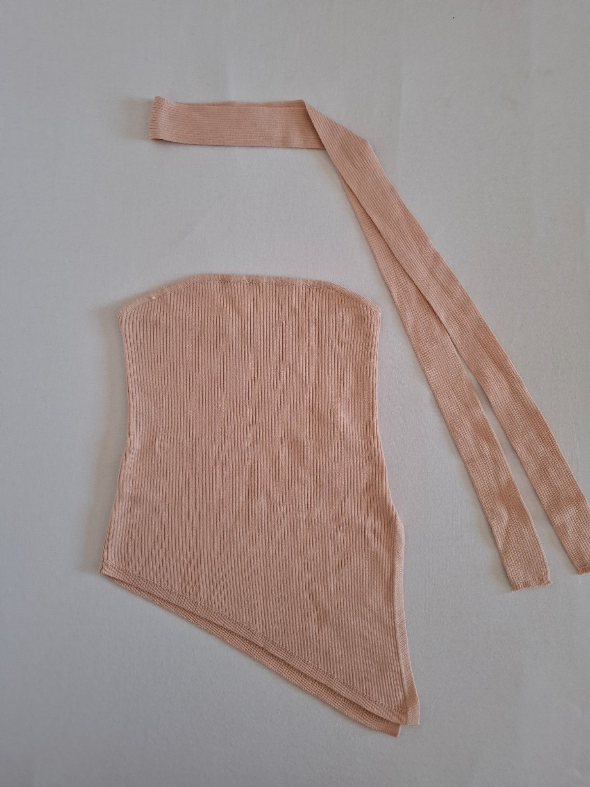 Asymmetrical top 