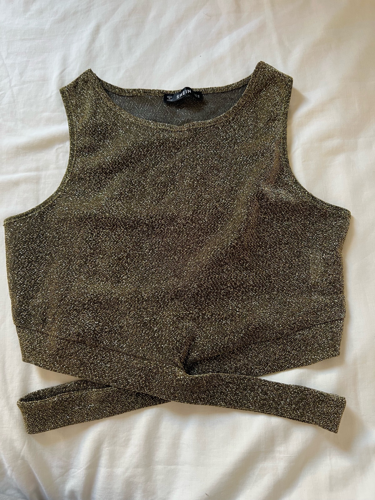 ‏top