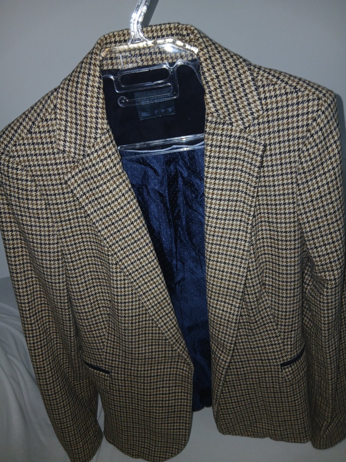 Blazer à carreaux en excellent état 