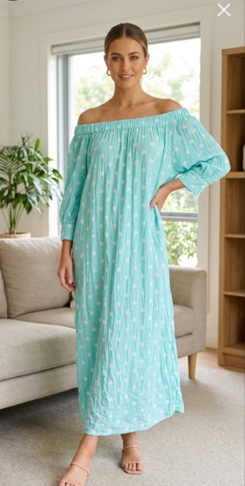 Une très belle robe col bateau très tendance tissu bered taille standard jusqu'à 46 