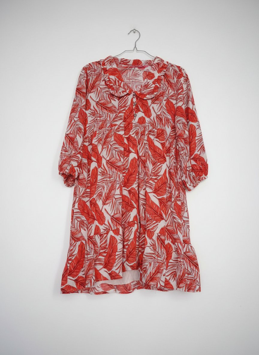 Une très belle robe tissu bered comme neuve 