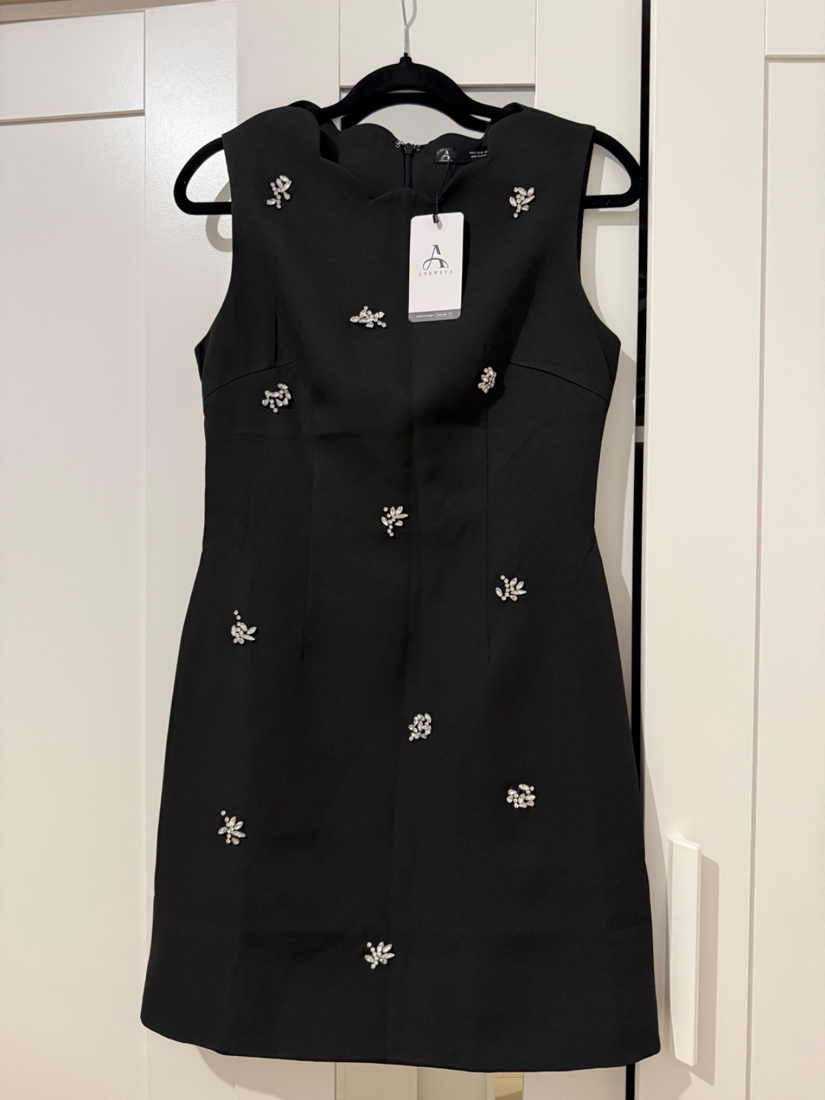 Robe noire mini avec poches