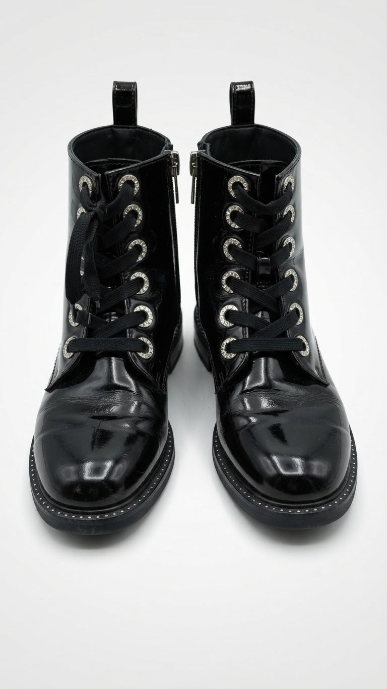 Bottines fille en similicuir noir pointure 30 en très bon état