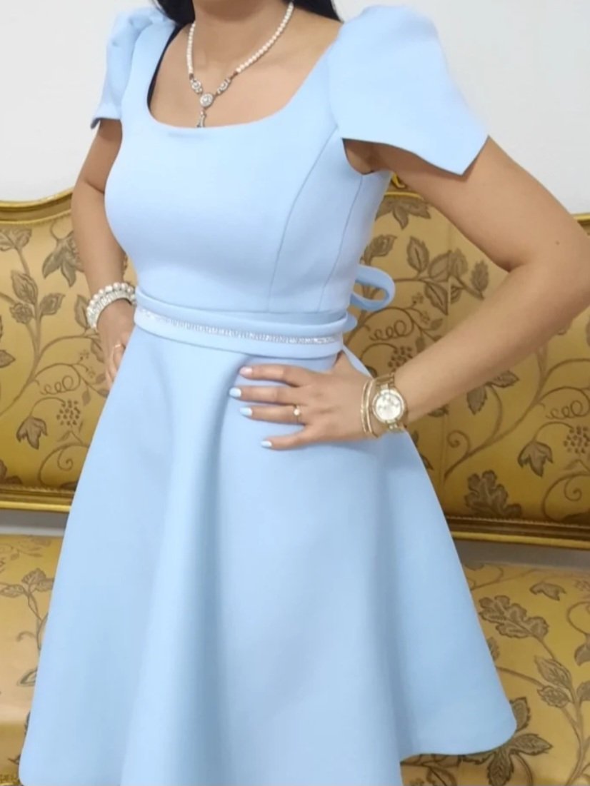 Magnifique robe bleu ciel