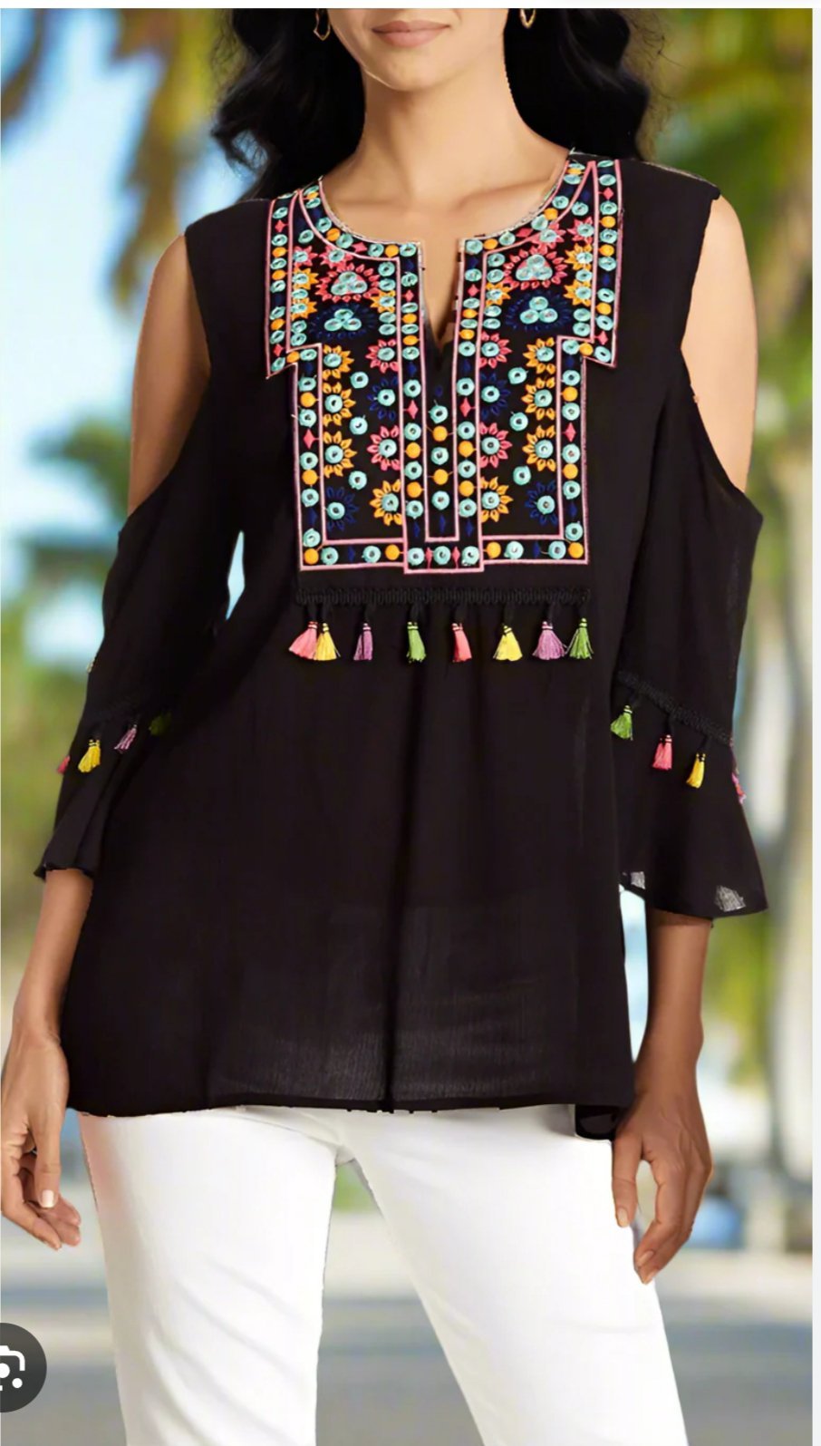 Pull avec pompon 