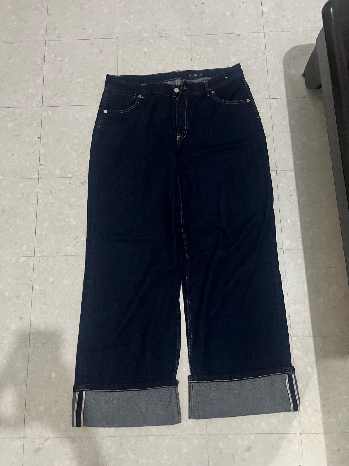Dark washed blue jeans 