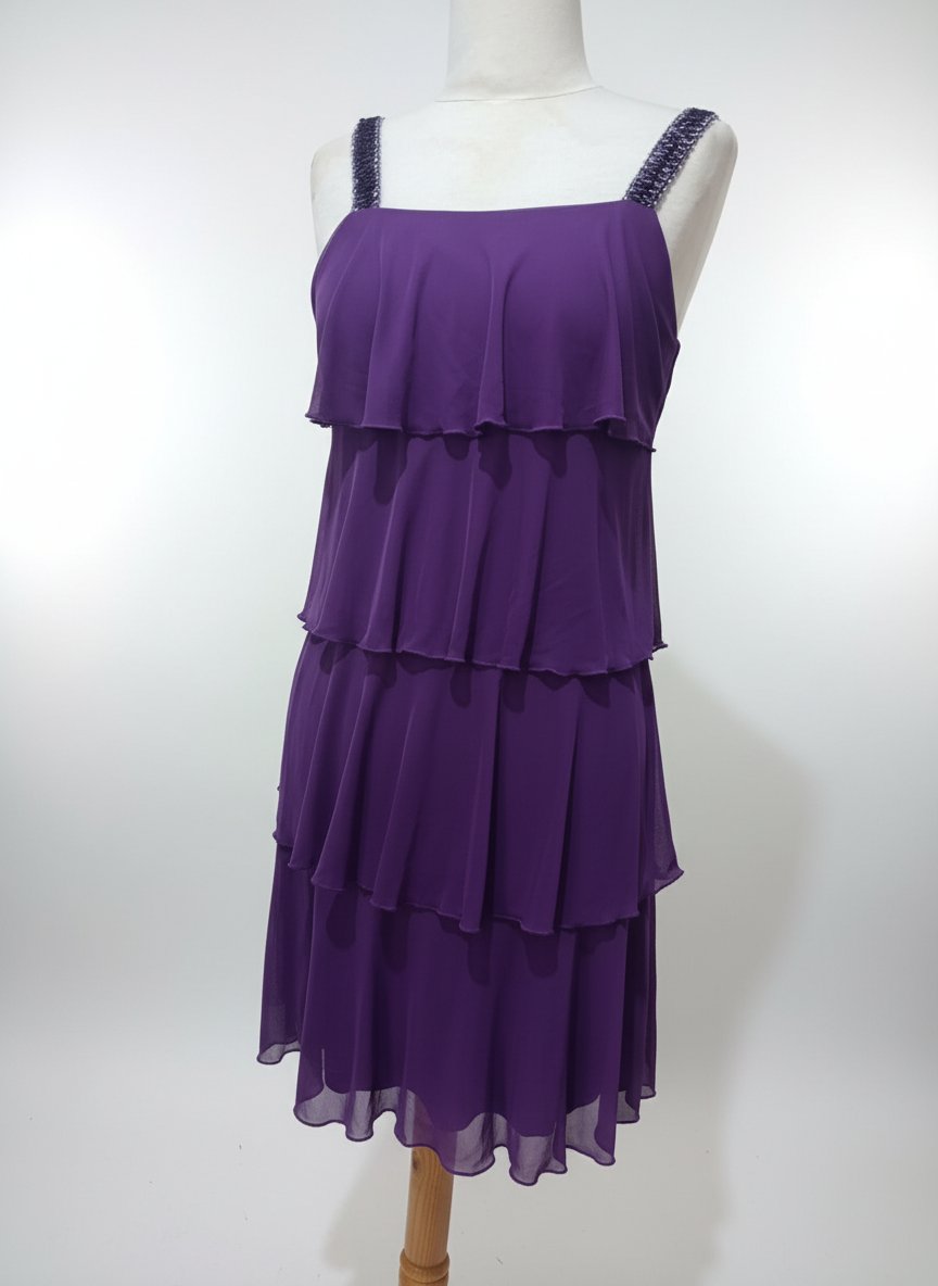 Robe cocktail a franges 