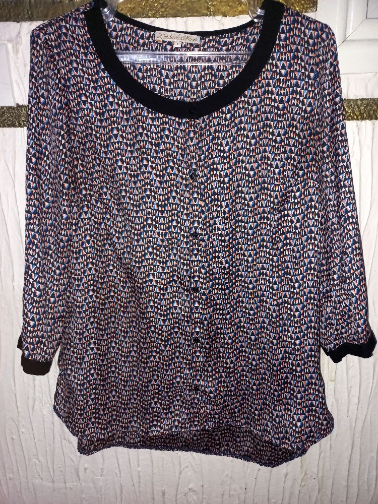 chemise 3/4 en très bon état tlabes 38/40