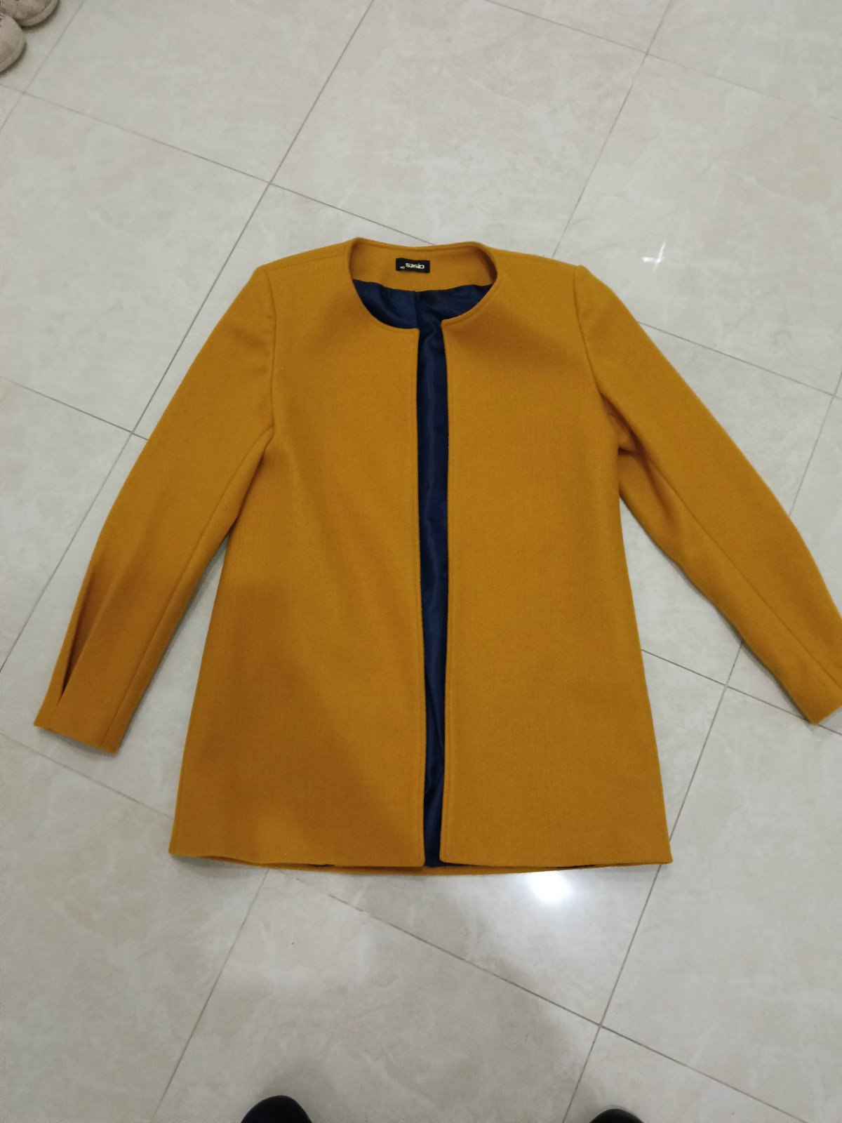 Manteau cachemire très chic pour Aid 