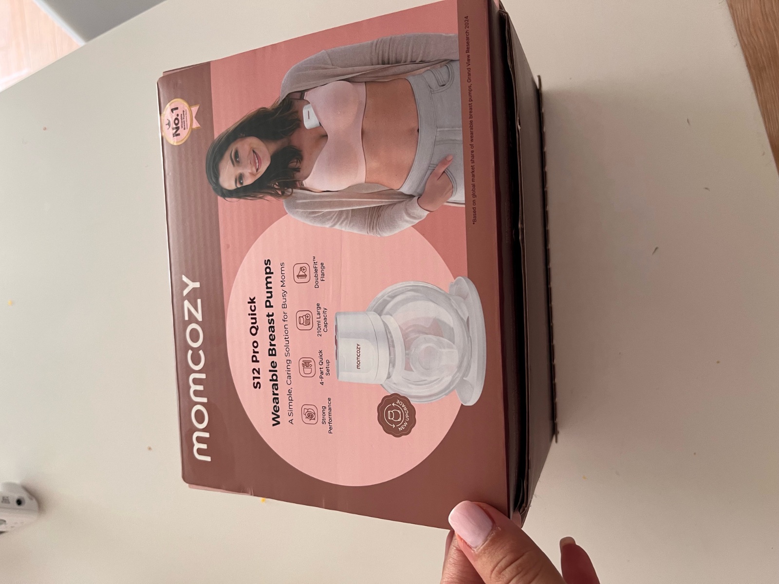 Momcozy tire lait