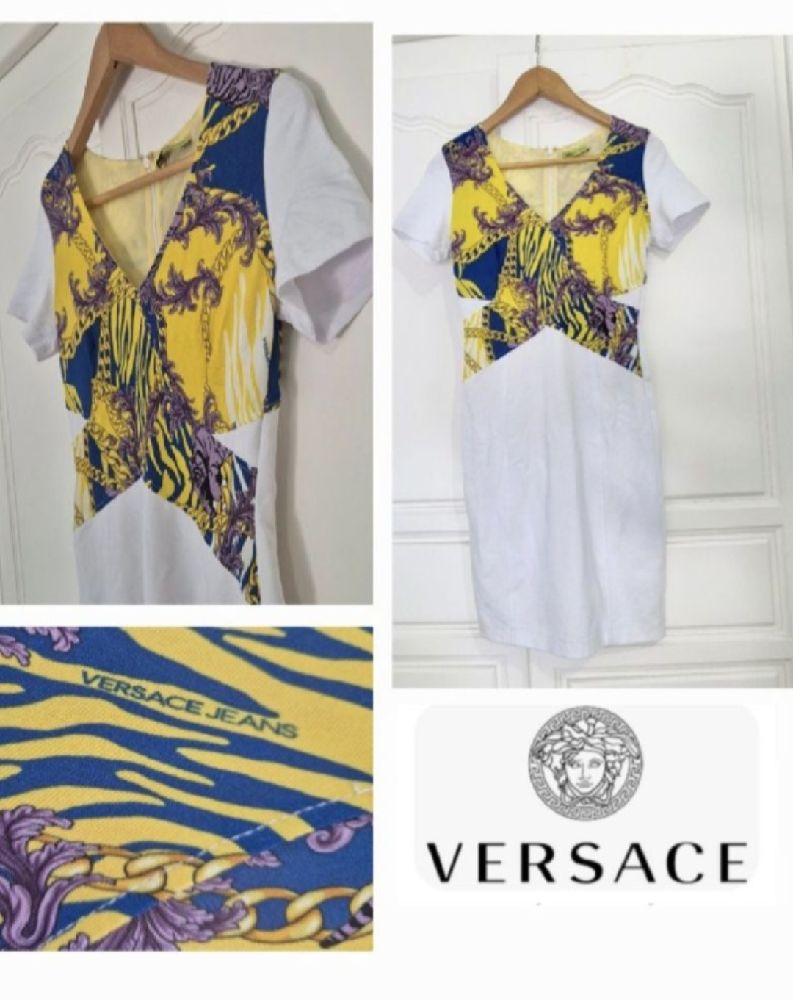 Magnifique robe versace authentique moulant très chic en très bon état 
