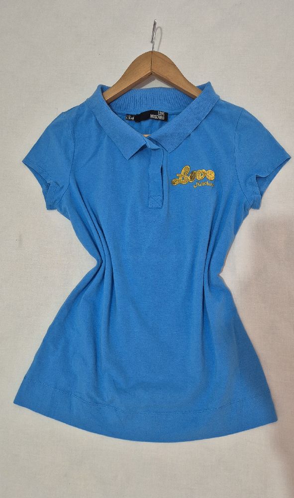 Très beau pull moschino avec logo tt neuf