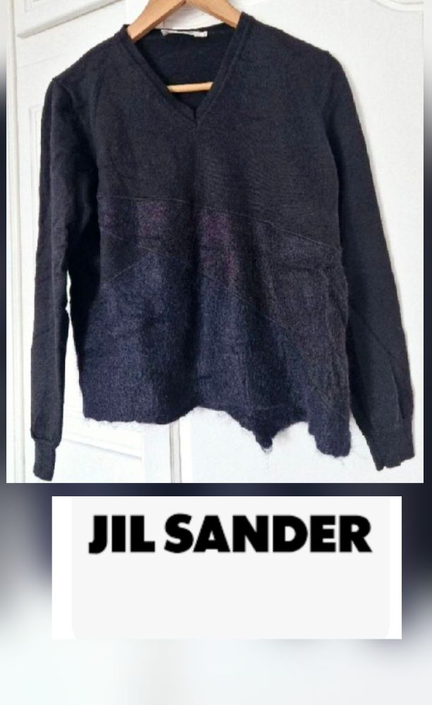 Très beau pull Jil sander col v tt neuf