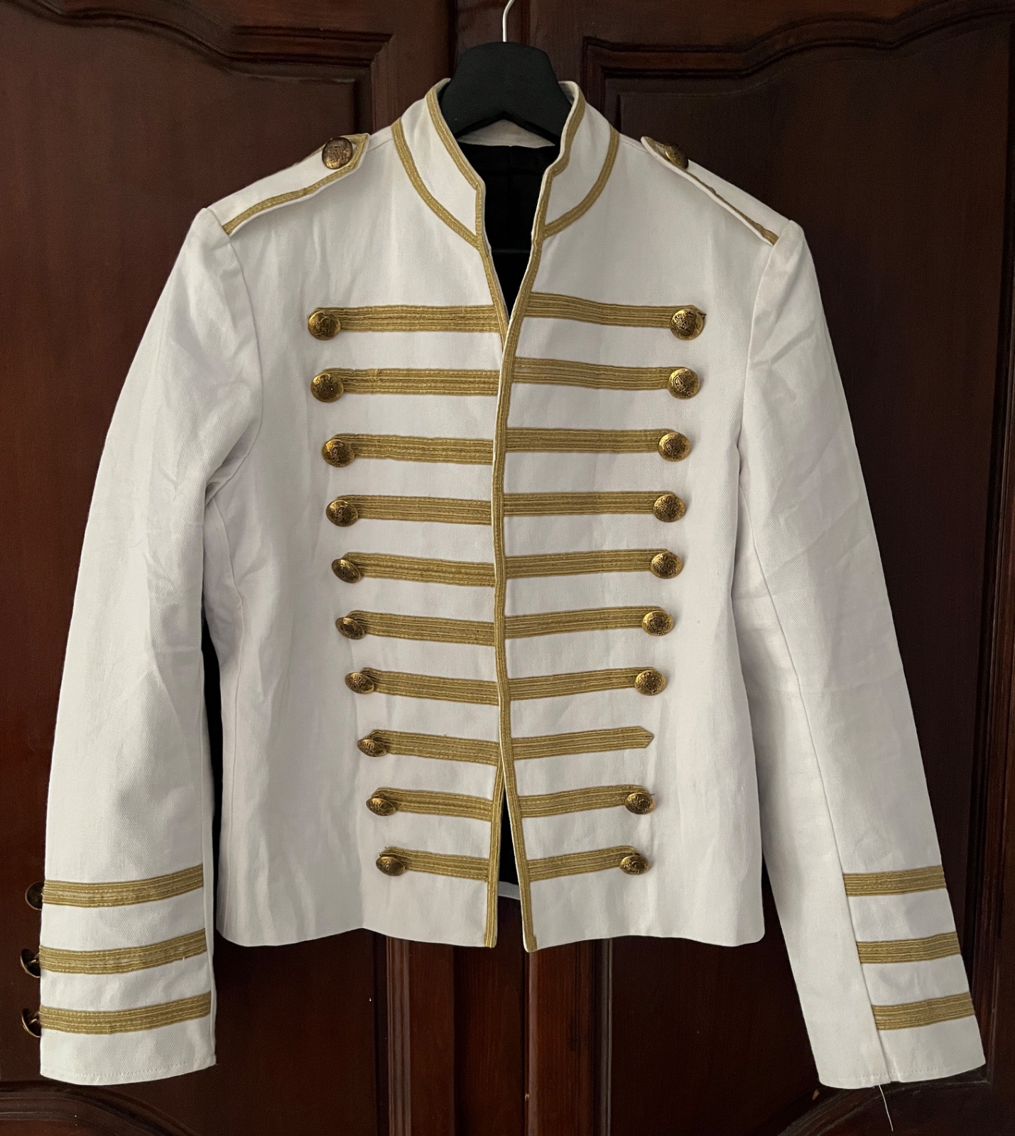 A white and gold military-style parade jacket , made in france 100% cotton .. tlbss petite M aussi 