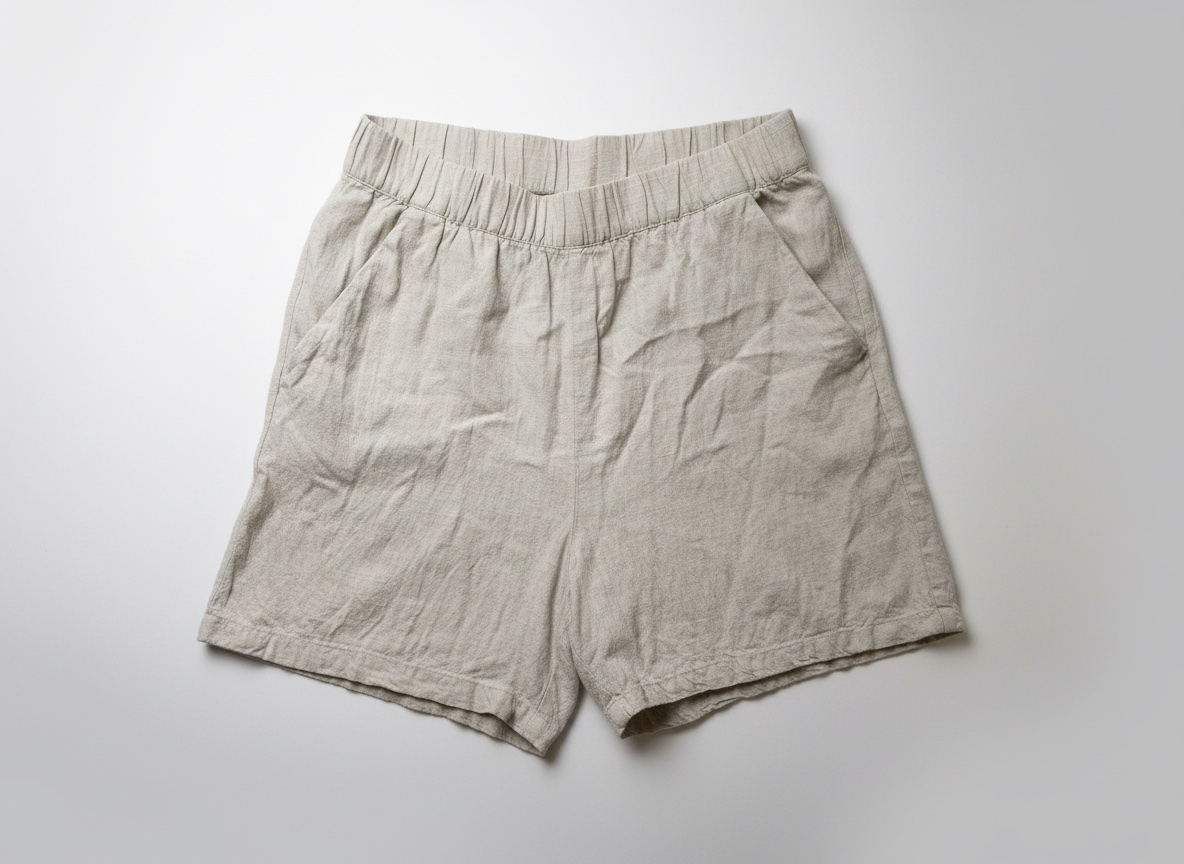 Beige high-waisted linen-blend pull-on shorts with an elastic waistband and side pockets