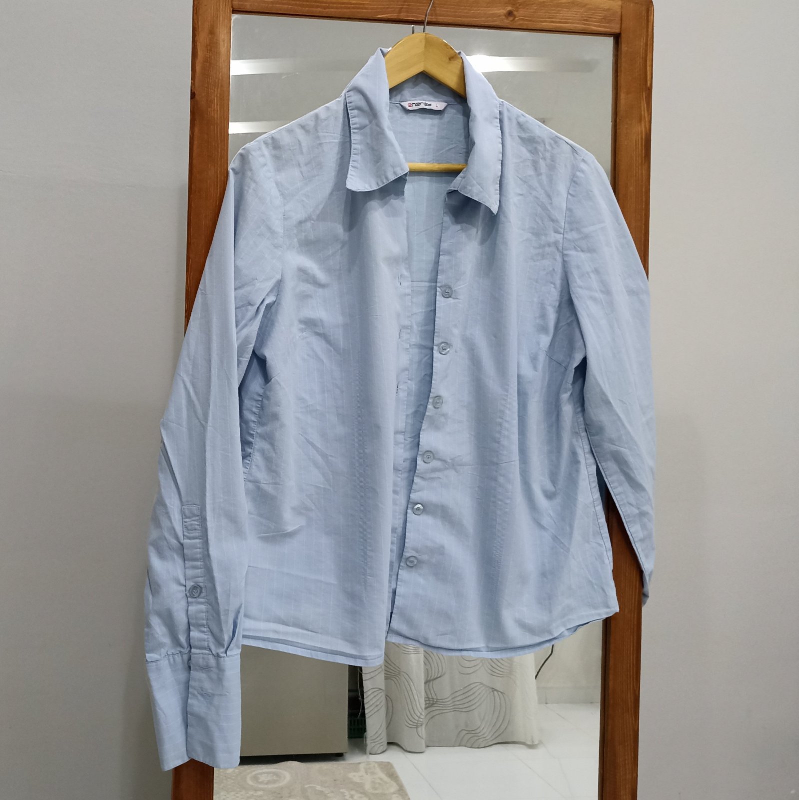 Chemise rayée en très bon état 