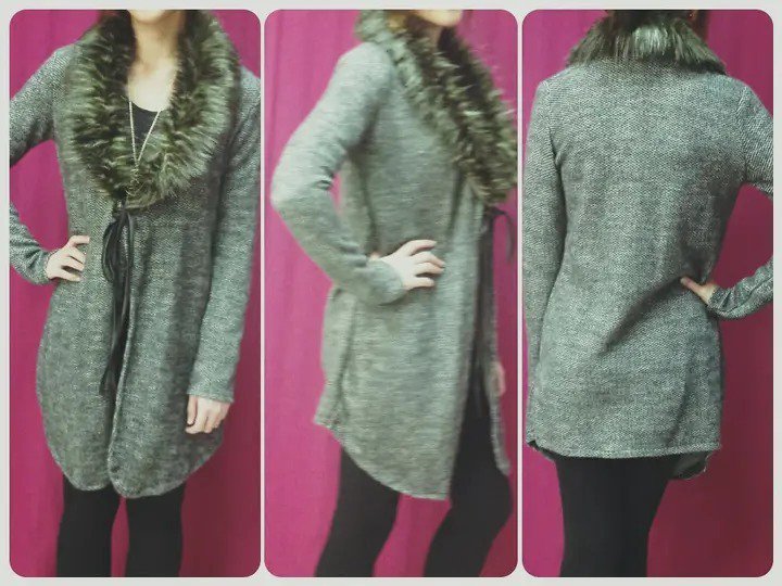 Gilet en maille grise avec un col en fausse fourrure bicolore et des liens de serrage à l'avant