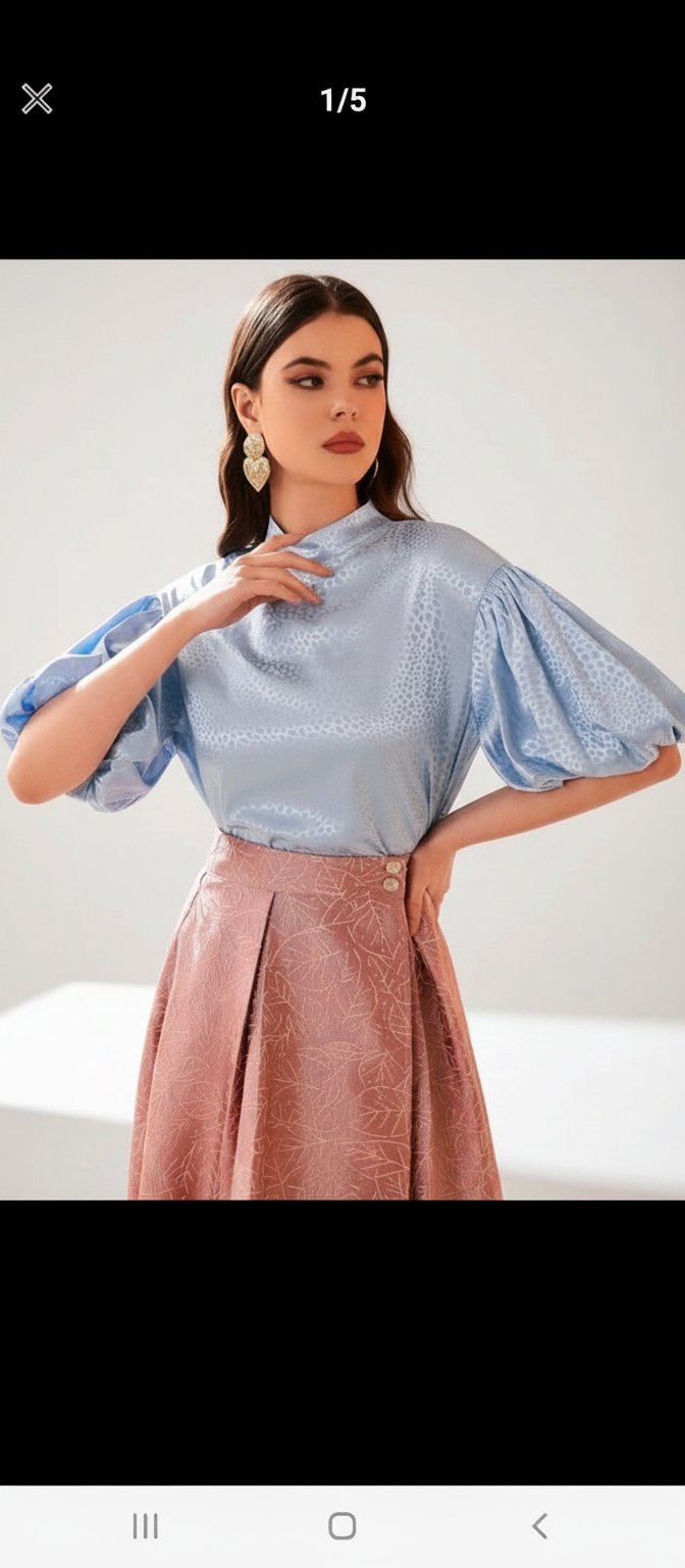 Blouse à manches bouffantes