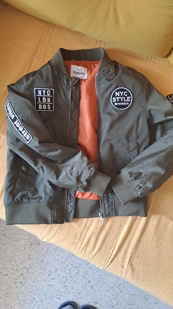 Veste neuve 134 cm