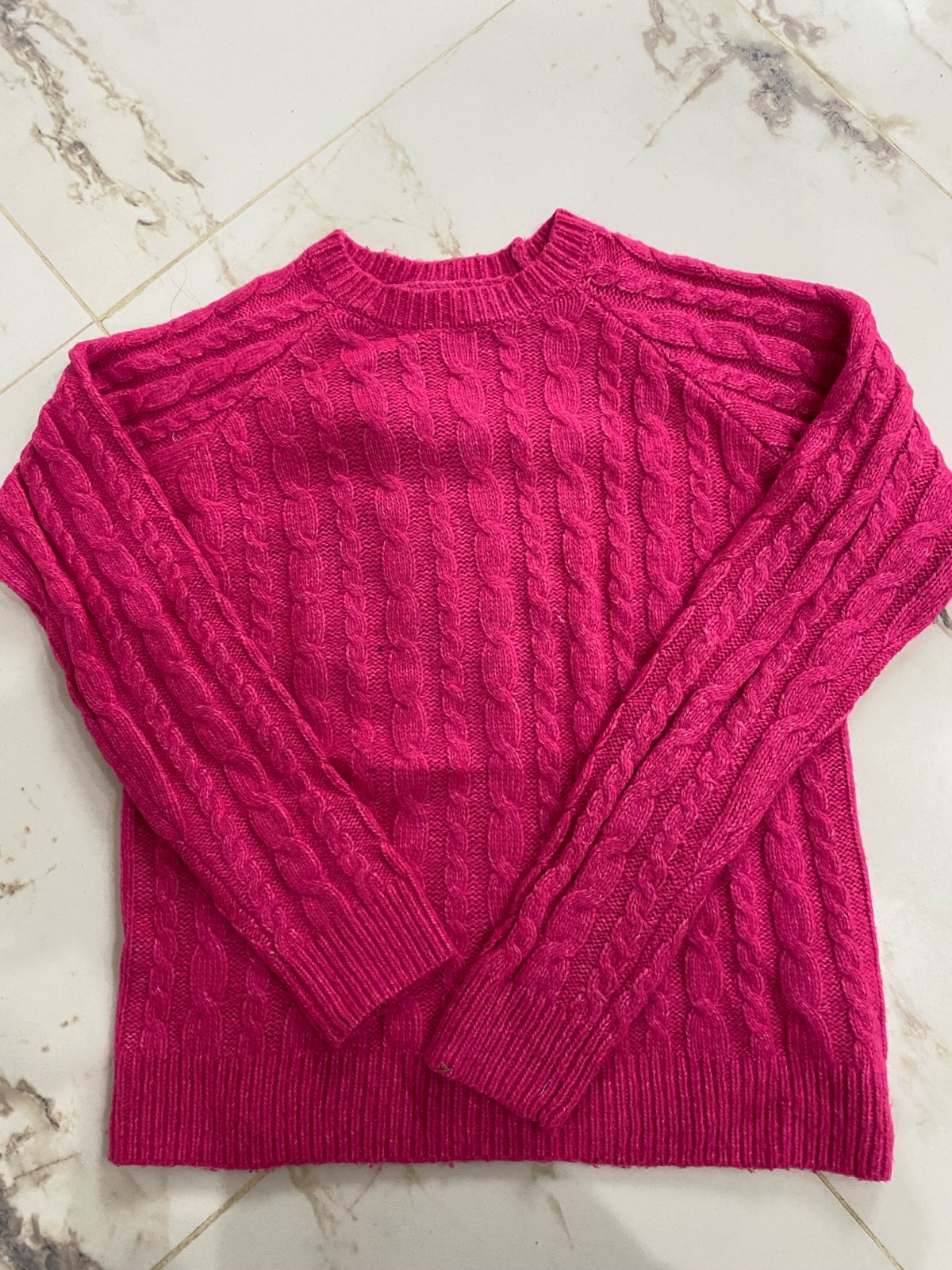 Pull rose fuchsia maille torsadée col rond