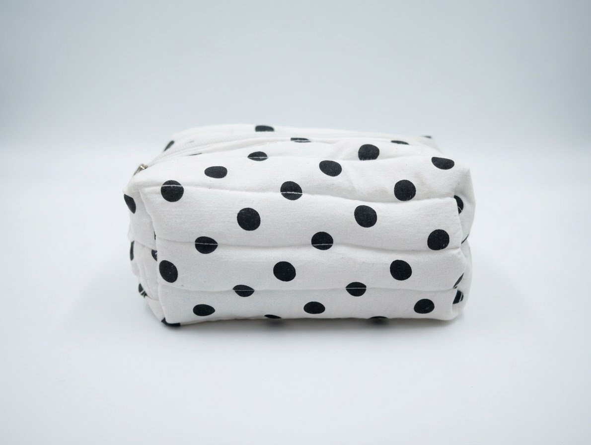 Pochette matelassée à pois