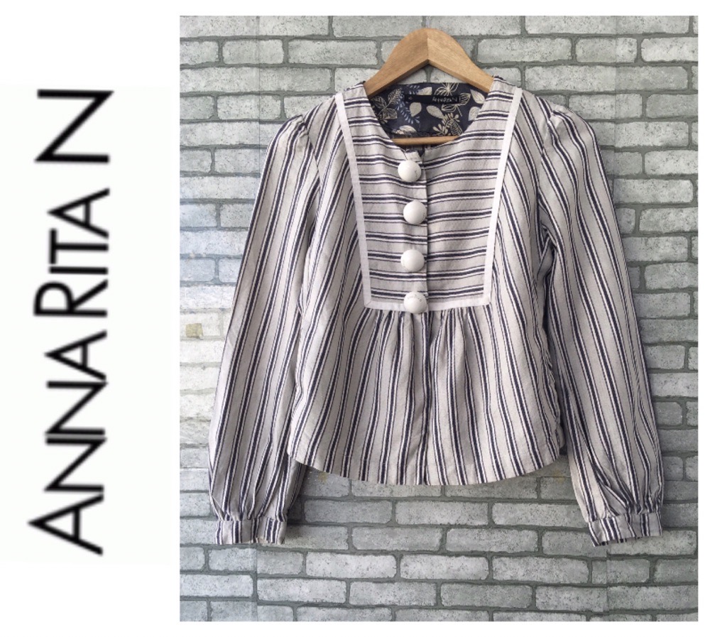 très magnifique blazer à manches bouffantes de la marque ANNARITA N 