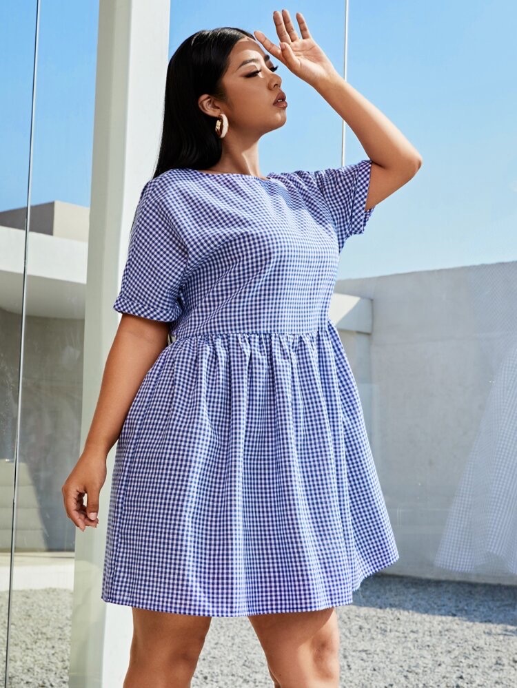 très jolie robe 👗 à carreaux manches courtes de la marque RESERVED 