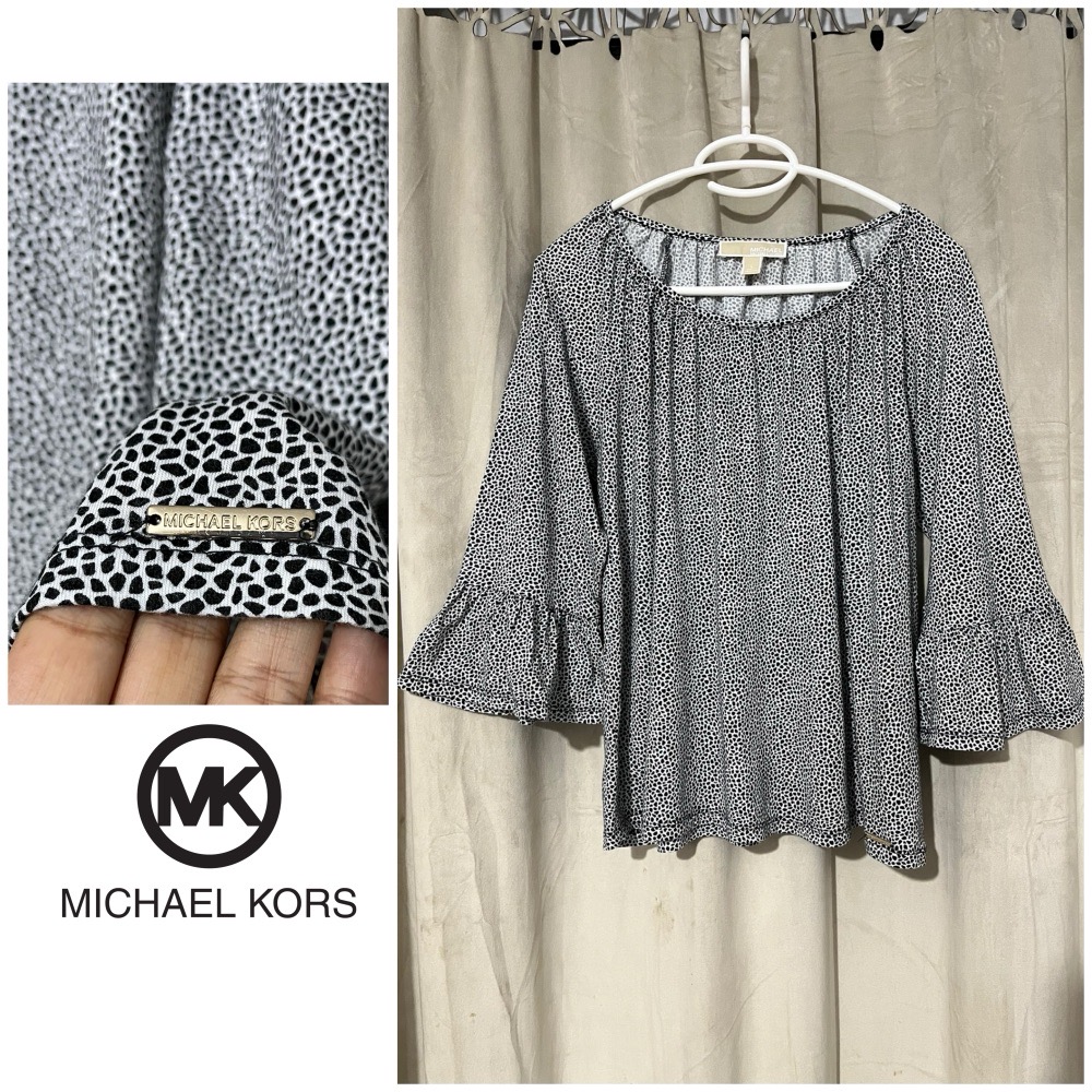 t-shirt à volonté de la marque Micheal kors taille L 