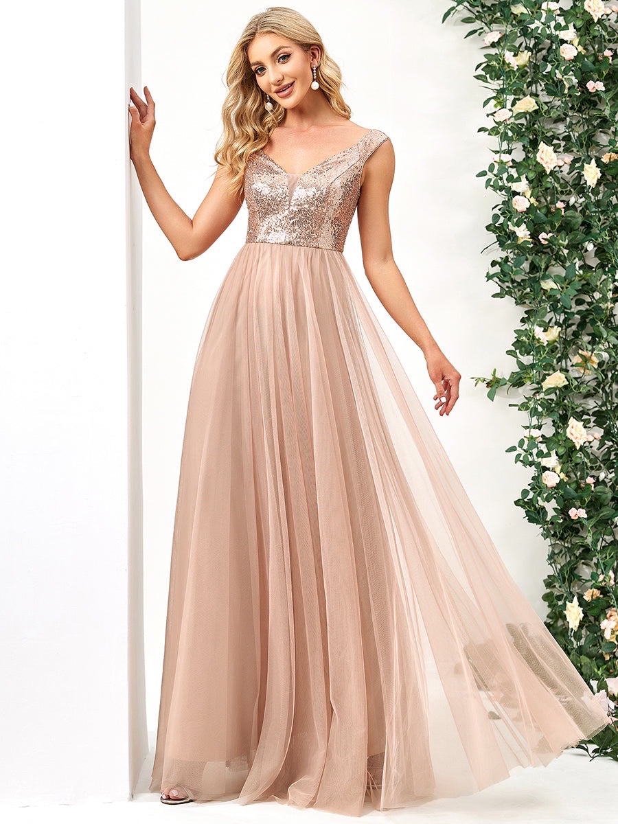 Robe soirée tissu pailletée et tulle .