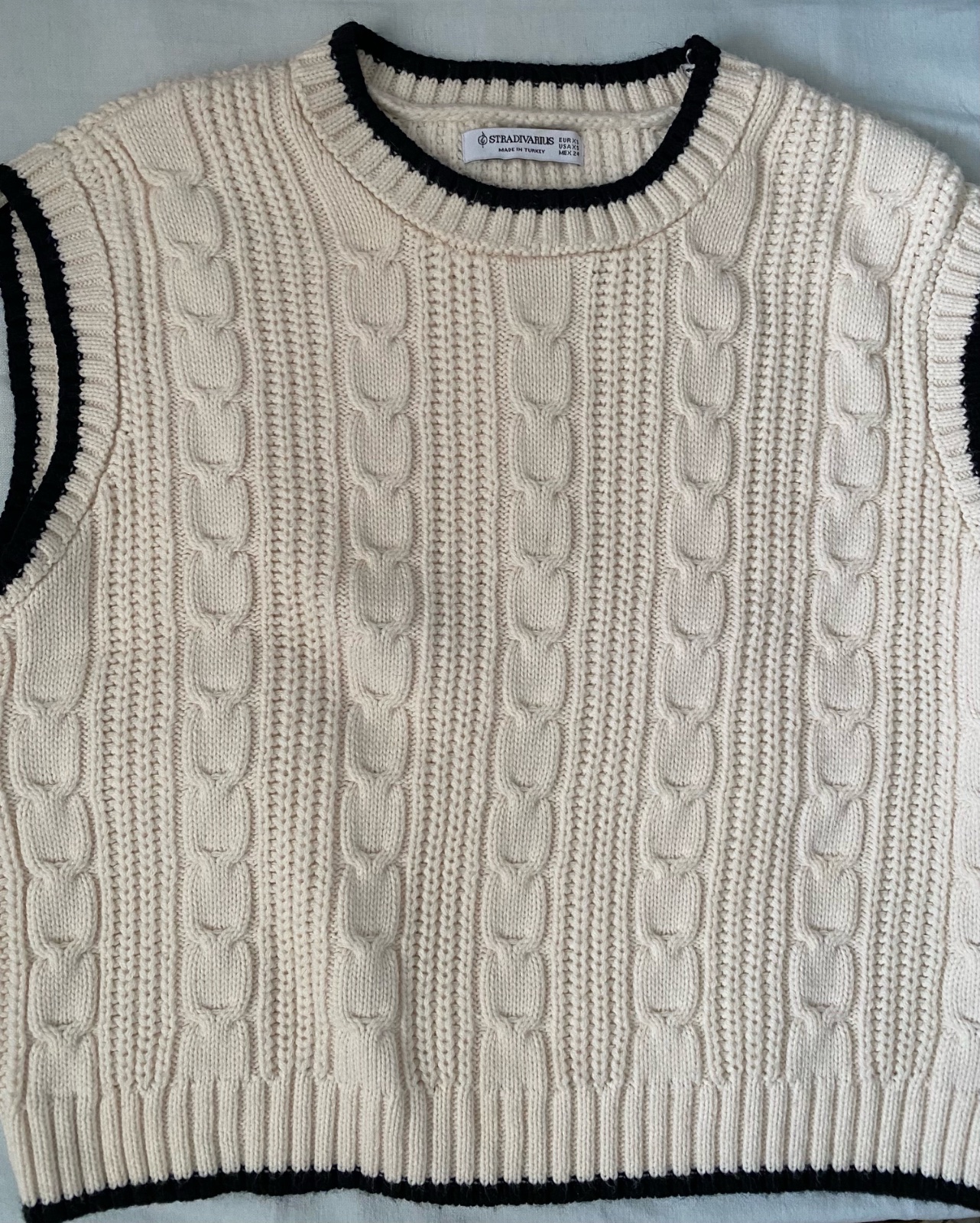 Pull sans manche blanc cassé
