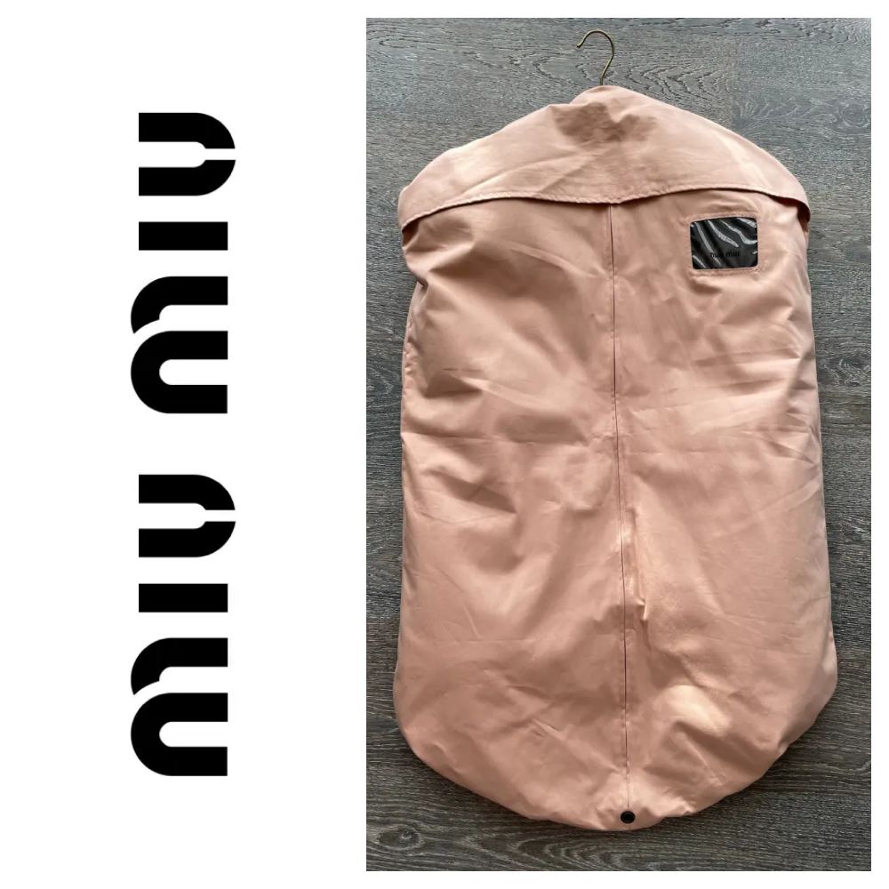 cache veste et manteau miu miu neuf