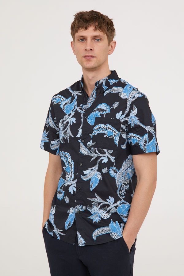 Chemise fleurie bleue et noir de la marque H&M 100 % coton