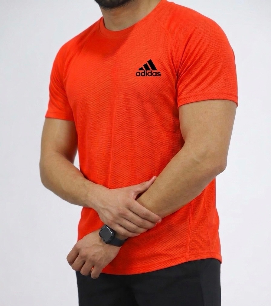 T-shirt orange vif de la marque Adidas
